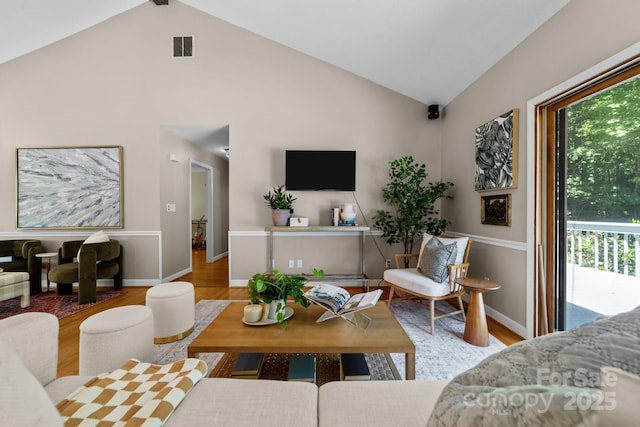 1827 Beckner Rd, Lexington, NC 27292 - living area with wood finished floors, baseboards, and high vaulted ceiling