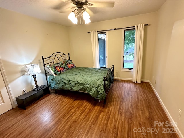 1827 Beckner Rd, Lexington, NC 27292 - bedroom with wood finished floors, baseboards, and a ceiling fan