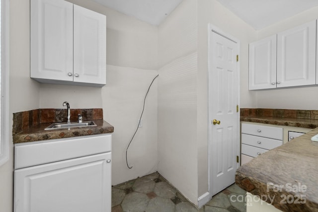 1827 Beckner Rd, Lexington, NC 27292 - kitchen with a sink, white cabinets, and dark countertops