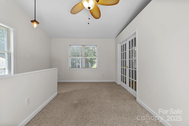 1827 Beckner Rd, Lexington, NC 27292 - unfurnished room with vaulted ceiling, carpet, a ceiling fan, and baseboards