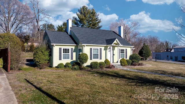 98 S Main St, Granite Falls, NC 28630 - view of front of property featuring a front yard and a chimney