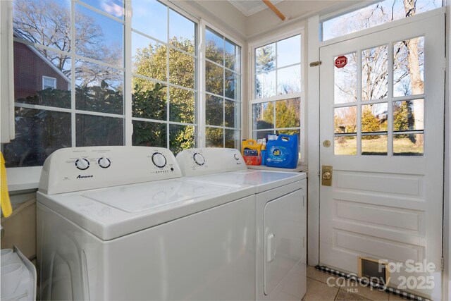 98 S Main St, Granite Falls, NC 28630 - laundry room featuring washing machine and dryer and light tile patterned floors