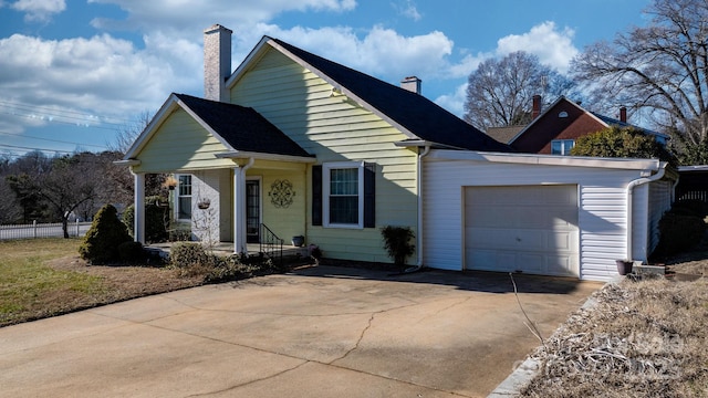 98 S Main St, Granite Falls, NC 28630 - view of front of property with an attached garage, concrete driveway, a chimney, and a porch