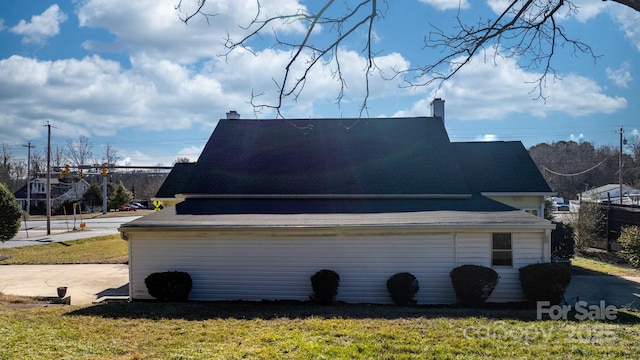 98 S Main St, Granite Falls, NC 28630 - view of home's exterior featuring a chimney and a yard
