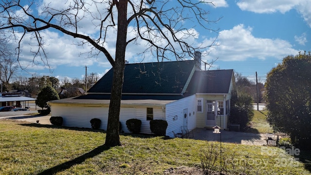98 S Main St, Granite Falls, NC 28630 - view of side of property with a yard and roof with shingles