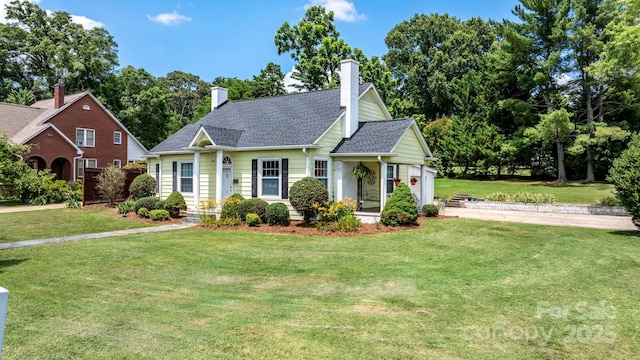 98 S Main St, Granite Falls, NC 28630 - view of front of property with a front lawn, roof with shingles, and a chimney