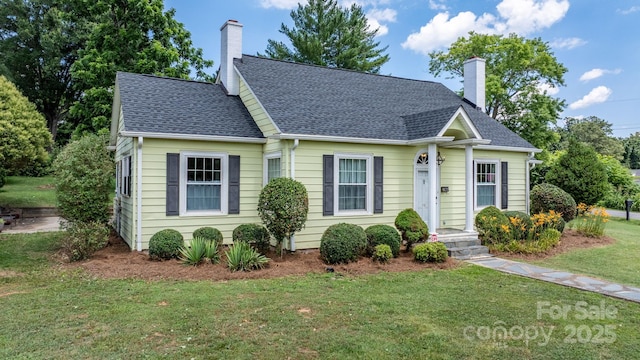 98 S Main St, Granite Falls, NC 28630 - view of front of home featuring a chimney, a front yard, and roof with shingles