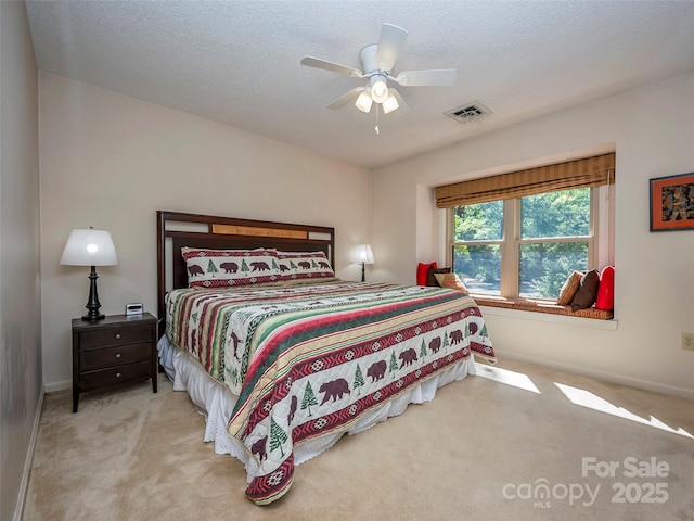 128 Quail Run Ct Unit 1627, Lake Lure, NC 28746 - carpeted bedroom with baseboards, a ceiling fan, and a textured ceiling