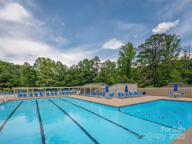 128 Quail Run Ct Unit 1627, Lake Lure, NC 28746 - community pool featuring a patio and view of scattered trees