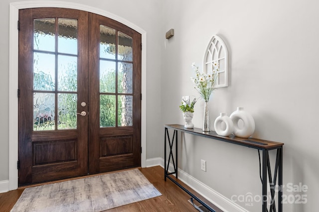 73 41st Ave NW, Hickory, NC 28601 - entrance foyer featuring french doors, baseboards, and dark wood-style floors