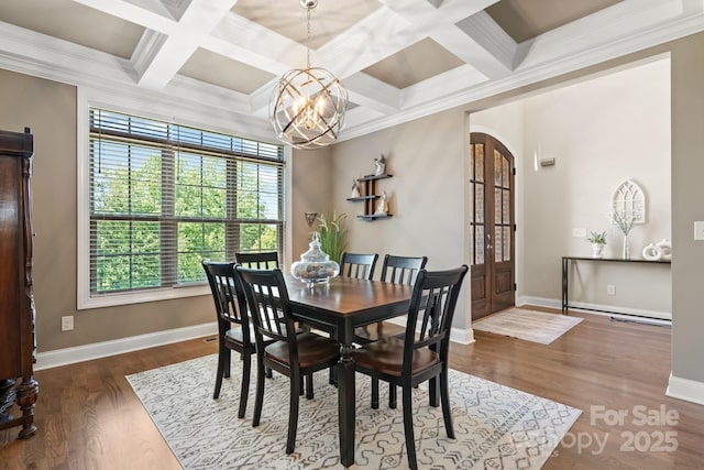 73 41st Ave NW, Hickory, NC 28601 - dining room featuring a chandelier, arched walkways, baseboards, wood finished floors, and beam ceiling