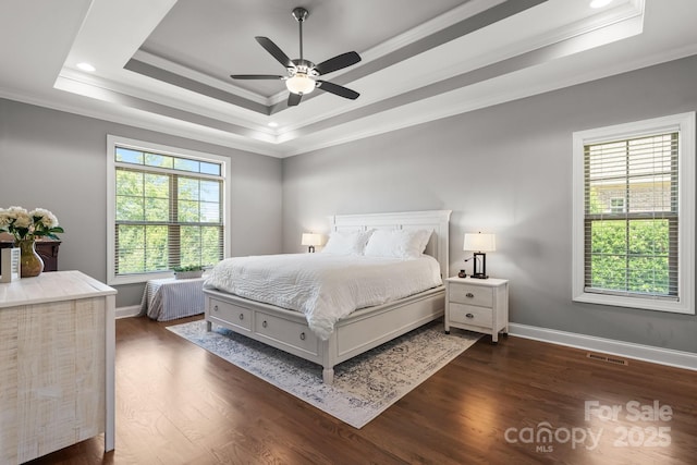 73 41st Ave NW, Hickory, NC 28601 - bedroom featuring a tray ceiling, ornamental molding, dark wood-style flooring, baseboards, and recessed lighting