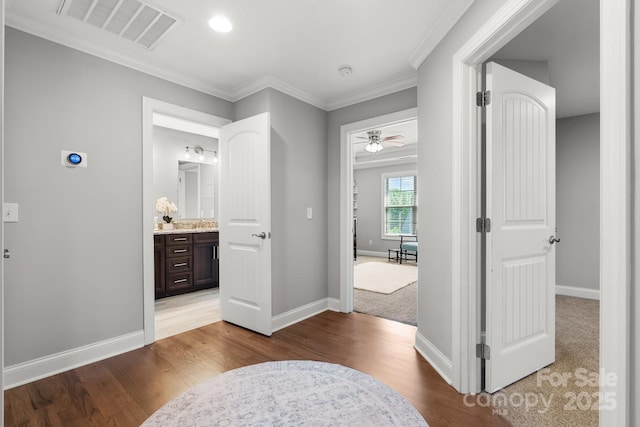 73 41st Ave NW, Hickory, NC 28601 - hallway featuring baseboards, wood finished floors, and ornamental molding