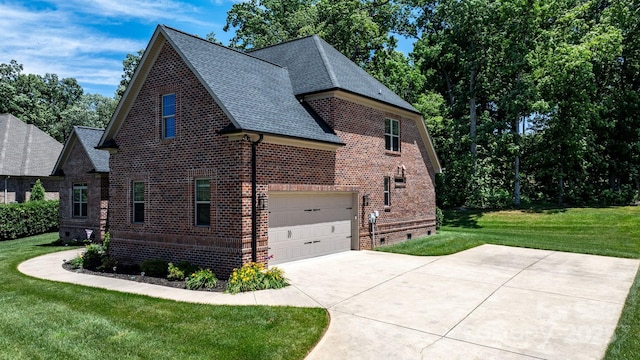 73 41st Ave NW, Hickory, NC 28601 - view of side of home featuring brick siding, a lawn, driveway, roof with shingles, and an attached garage