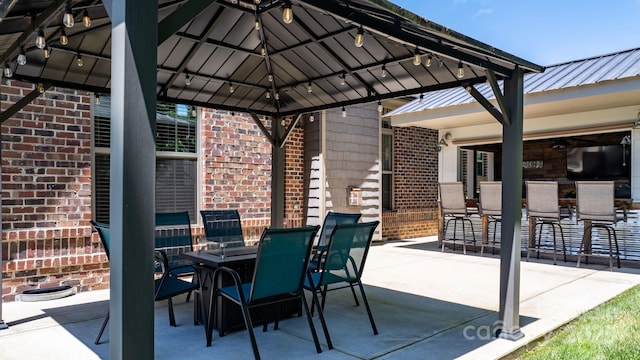 73 41st Ave NW, Hickory, NC 28601 - view of patio / terrace with a gazebo and outdoor dining space