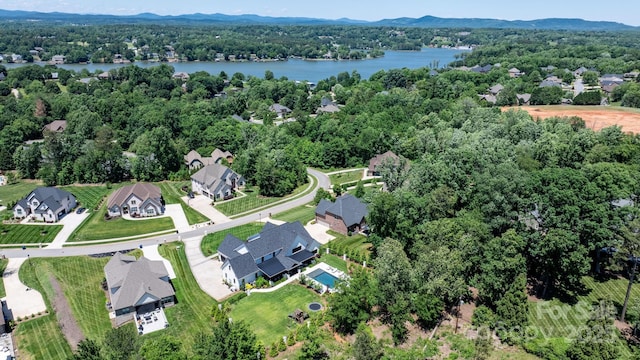 73 41st Ave NW, Hickory, NC 28601 - aerial overview of property's location featuring a water and mountain view, nearby suburban area, and a forest