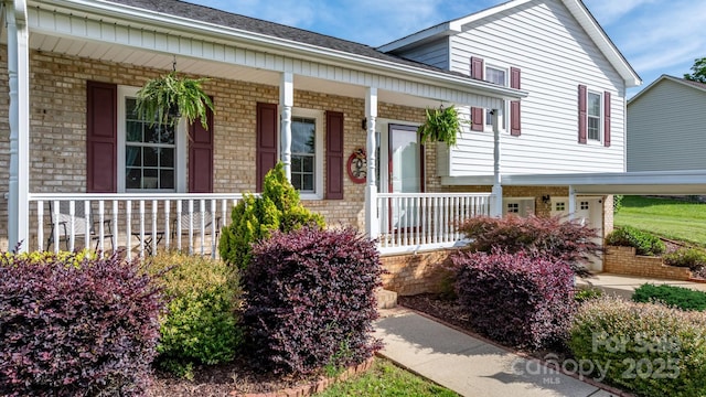 10 Hunters Ridge Ct, Granite Falls, NC 28630 - view of front of home with covered porch and brick siding