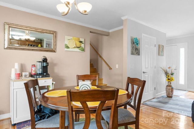 10 Hunters Ridge Ct, Granite Falls, NC 28630 - dining area with a chandelier, light wood-style flooring, crown molding, stairway, and baseboards
