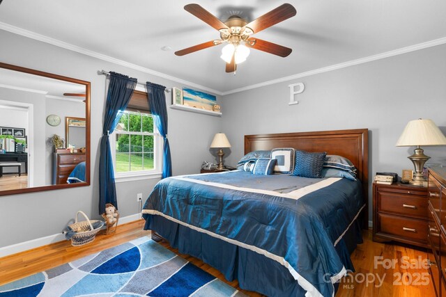 10 Hunters Ridge Ct, Granite Falls, NC 28630 - bedroom with wood finished floors, crown molding, baseboards, and a ceiling fan