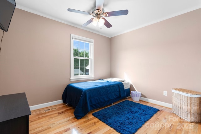 10 Hunters Ridge Ct, Granite Falls, NC 28630 - bedroom with wood finished floors, baseboards, crown molding, and ceiling fan