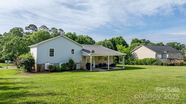 10 Hunters Ridge Ct, Granite Falls, NC 28630 - back of property featuring a yard, a patio, and cooling unit