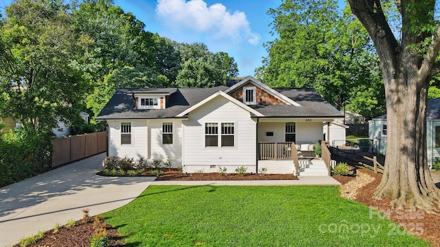 343 Melbourne Ct, Charlotte, NC 28209 - view of front of house featuring crawl space, covered porch, roof with shingles, and concrete driveway