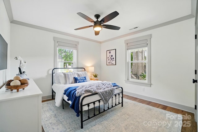 343 Melbourne Ct, Charlotte, NC 28209 - bedroom featuring wood finished floors, baseboards, and ceiling fan