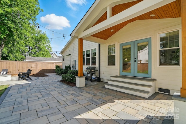 343 Melbourne Ct, Charlotte, NC 28209 - view of patio featuring french doors, a grill, and entry steps