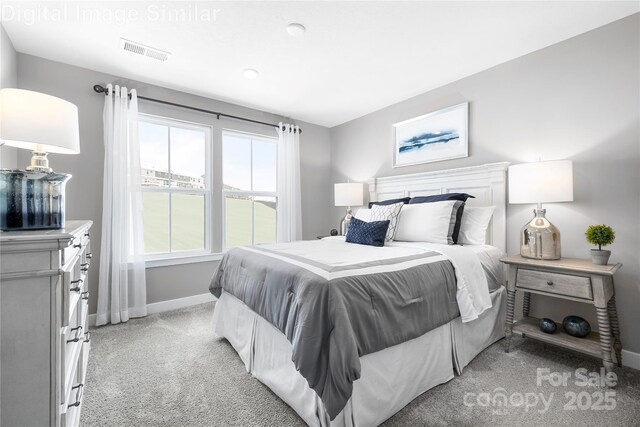 7335 Childress Dr, Concord, NC 28025 - bedroom with light colored carpet and baseboards