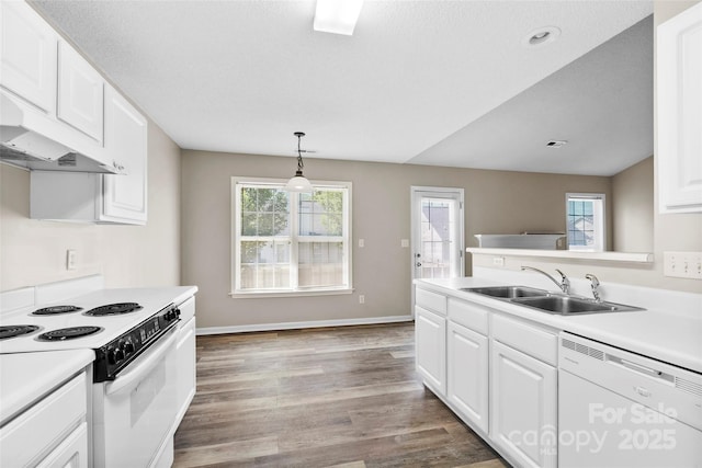 370 Running Briar Rd, Fletcher, NC 28732 - kitchen with white appliances, a sink, white cabinets, light countertops, and plenty of natural light
