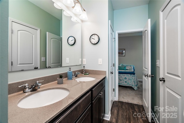 6038 Durango Way, Denver, NC 28037 - bathroom featuring double vanity, wood finished floors, and ensuite bath