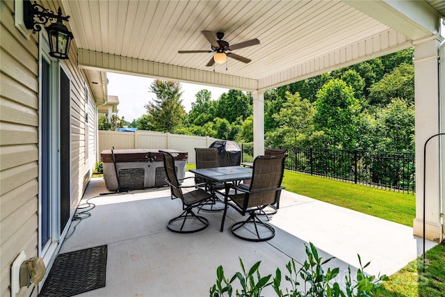6038 Durango Way, Denver, NC 28037 - fenced backyard with a hot tub, a ceiling fan, a patio area, and outdoor dining space