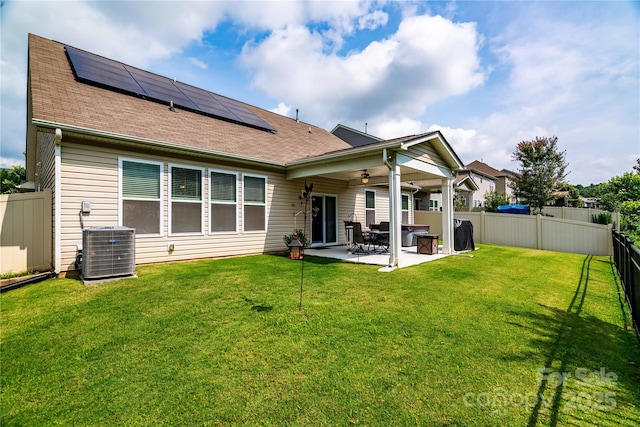 6038 Durango Way, Denver, NC 28037 - back of house with central air condition unit, solar panels, a patio area, a ceiling fan, and roof with shingles