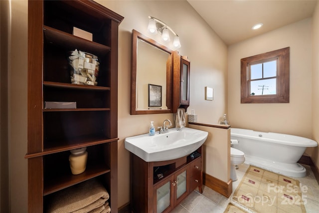 4862 Pinnacle Mountain Rd, Zirconia, NC 28790 - bathroom featuring a freestanding tub, vanity, and tile patterned floors