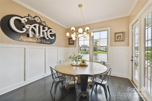 164 Twin Sisters Ln, Mooresville, NC 28117 - dining room with a decorative wall, a wainscoted wall, crown molding, a chandelier, and dark wood-style floors