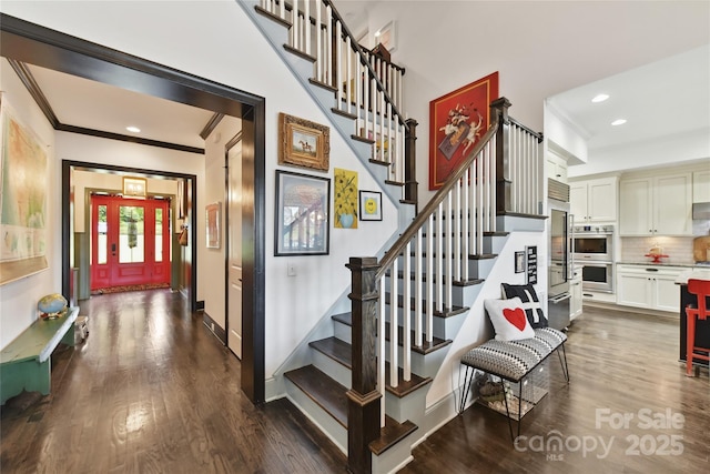164 Twin Sisters Ln, Mooresville, NC 28117 - staircase with wood finished floors, ornamental molding, recessed lighting, and baseboards