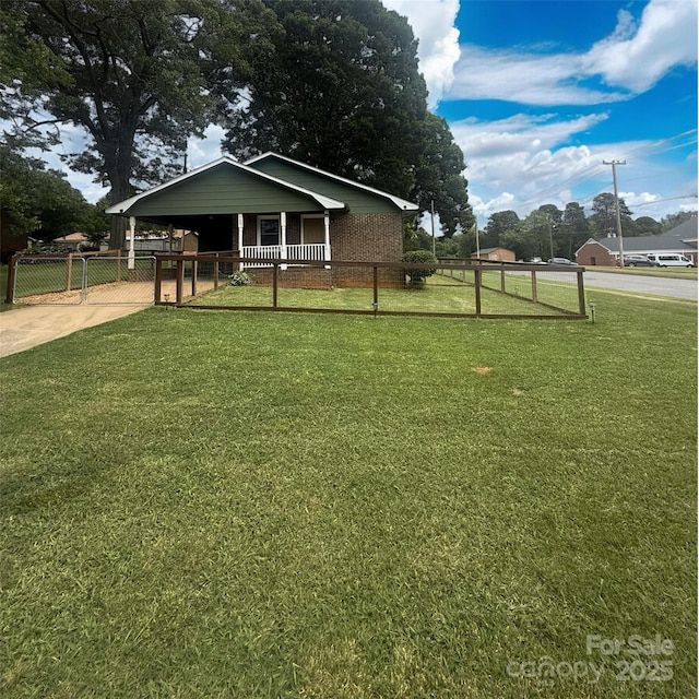 300 N Watterson St, Kings Mountain, NC 28086 - view of front facade with brick siding and a carport