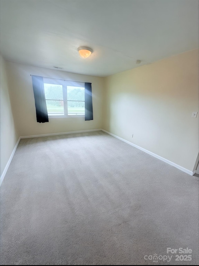 300 N Watterson St, Kings Mountain, NC 28086 - carpeted empty room with baseboards