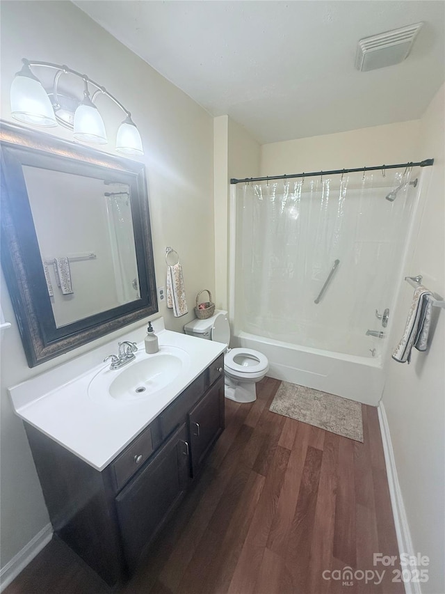 300 N Watterson St, Kings Mountain, NC 28086 - full bathroom with wood finished floors, toilet, vanity, and shower / bath combo