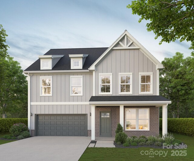 1807 Country Club Rd, Lincolnton, NC 28092 - view of front of home with board and batten siding, driveway, a garage, brick siding, and roof with shingles