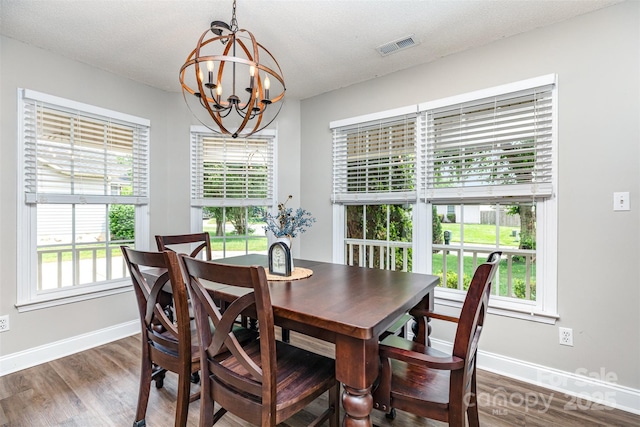 1626 Riverglenn Ct, Rock Hill, SC 29732 - dining area with a chandelier, wood finished floors, and baseboards