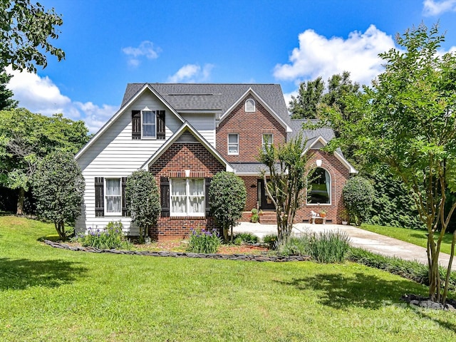 2325 Perry Rd, Denver, NC 28037 - traditional home with brick siding and a front yard