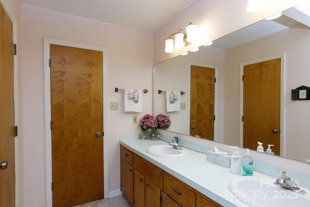 517 Powell St, Rock Hill, SC 29732 - full bathroom with double vanity and tile patterned flooring