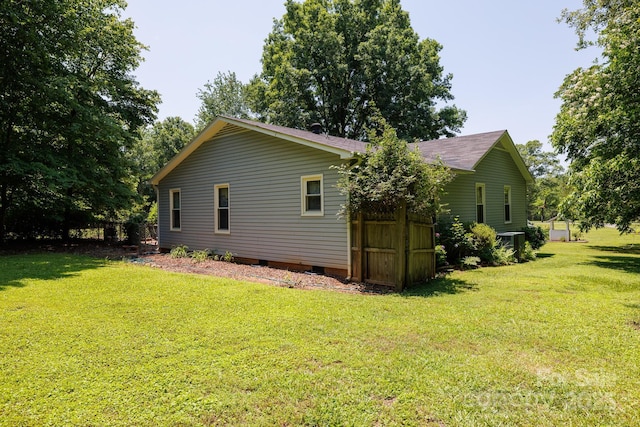517 Powell St, Rock Hill, SC 29732 - view of side of property with a lawn, crawl space, and central air condition unit