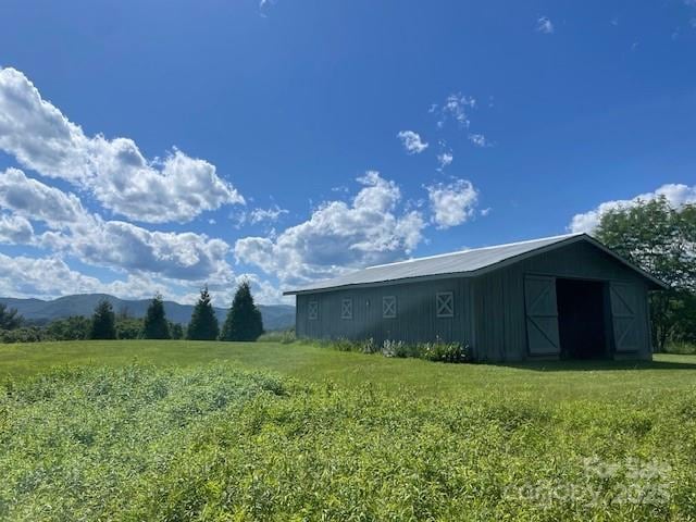 250 Huey Rd, Marshall, NC 28753 - view of grassy yard featuring an outbuilding