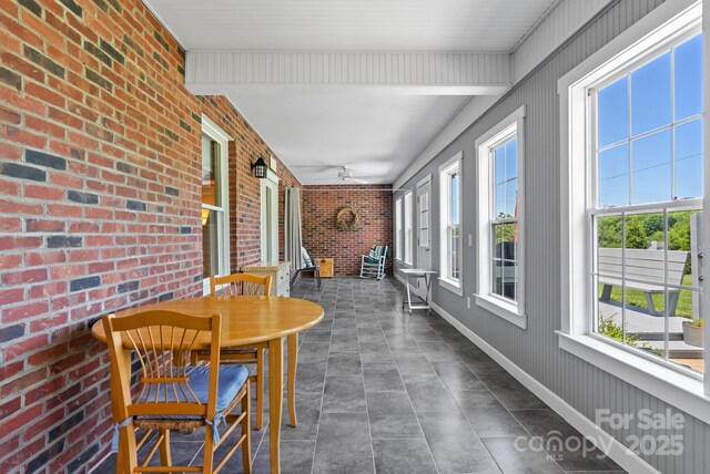 250 Huey Rd, Marshall, NC 28753 - sunroom / solarium featuring brick wall and a ceiling fan