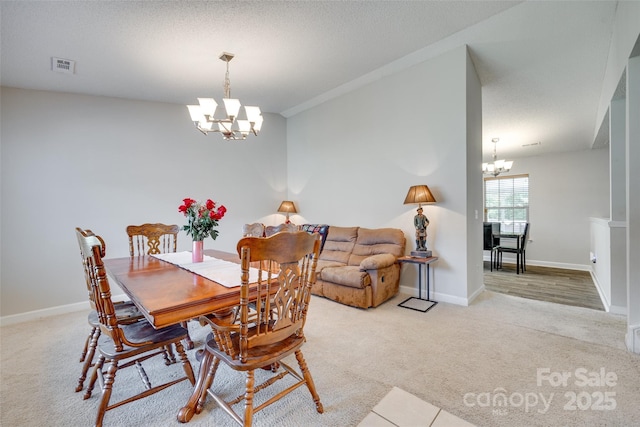 1791 Rosewell Dr Unit 65, Rock Hill, SC 29732 - carpeted dining room featuring a chandelier and baseboards