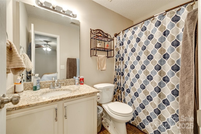 1791 Rosewell Dr Unit 65, Rock Hill, SC 29732 - bathroom featuring vanity, a textured ceiling, toilet, wood finished floors, and ceiling fan