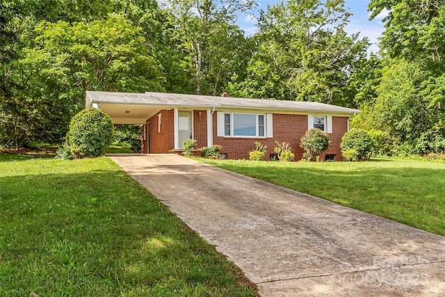 1125 Windy Acres St, Morganton, NC 28655 - ranch-style home featuring driveway, brick siding, a front lawn, and an attached carport