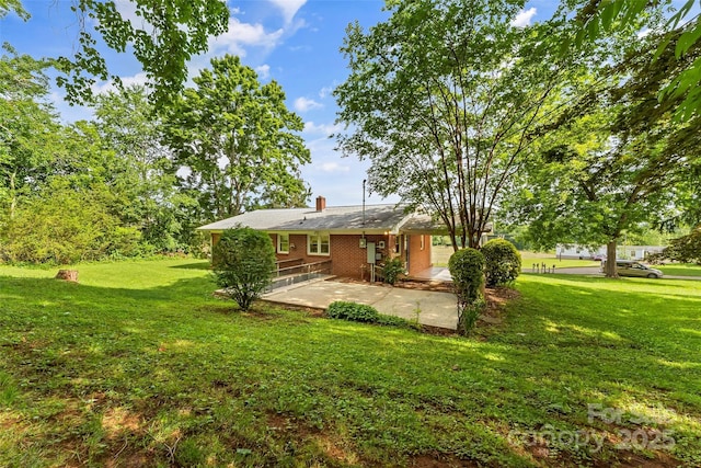 1125 Windy Acres St, Morganton, NC 28655 - view of grassy yard with a patio area